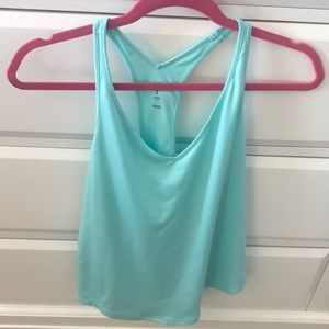 Under Armour work out shirt, light blue Medium